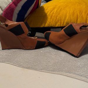 Womens US size 8; Caramel wedge with black elastic strappy detail